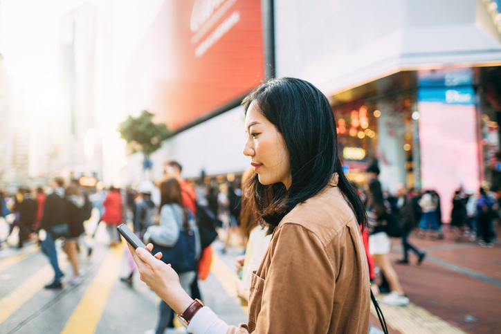 Woman walking on phone